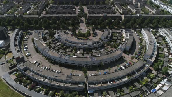 Drone Slowmotion of a Dutch Modern Neighborhood in Zoetermeer. Family Houses surrounded by Trees, du