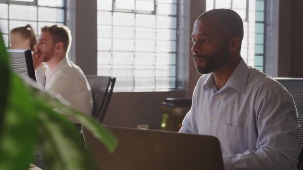 Young creative professionals working in a modern office