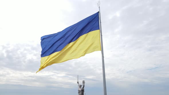 Kyiv - National Flag of Ukraine By Day. Aerial View. Kiev. Slow Motion