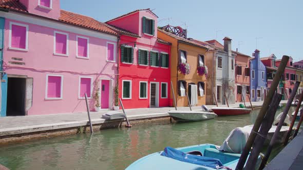 Colorful Houses on Burano Water Channel Bank with Boats