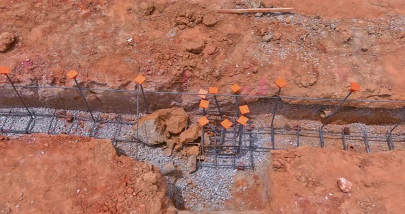 During the Preparation of a New Home a Trench Under in the Concrete Foundation is Dug