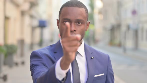 Outdoor Attractive African Businessman Fighting in Anger