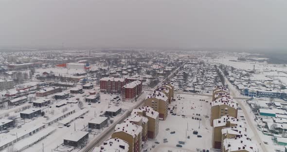 Sovetskiy city. Aerial. Winter, snow, cloudy. Khanty Mansiysk Autonomous Okrug (HMAO), Russia. 02