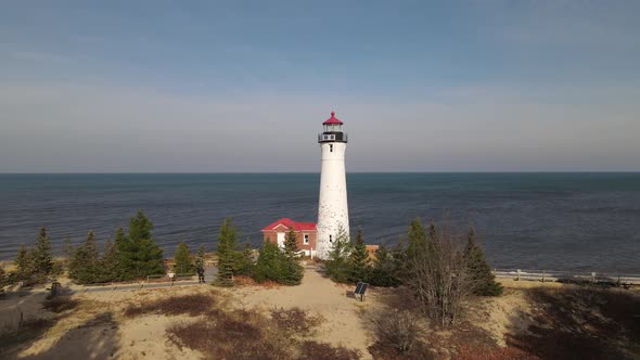 4k drone video of Crisp Point Lighthouse in Michigan during the fall.