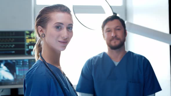 Professional medical doctors working in emergency medicine. Portrait of surgeon and the nurse.