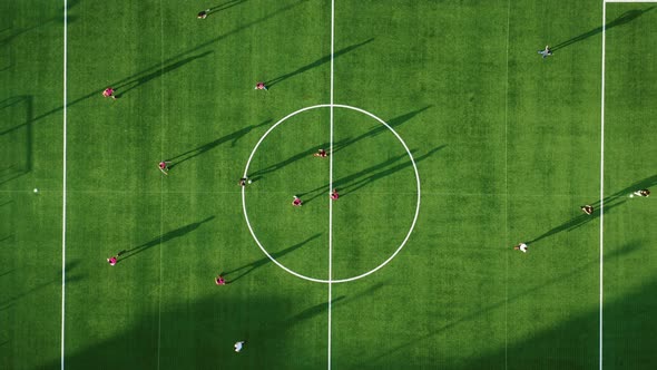 Soccer Match at Sunset Light