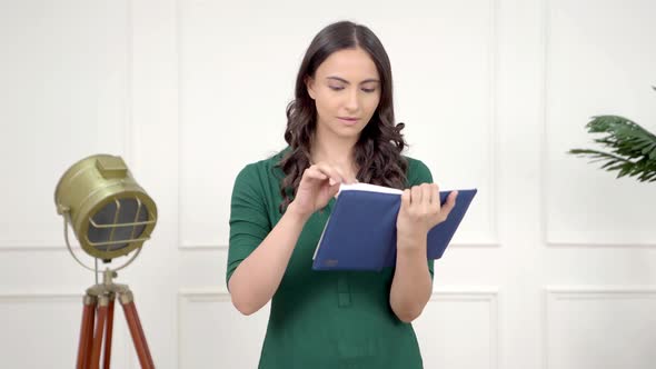 Indian girl reading a book