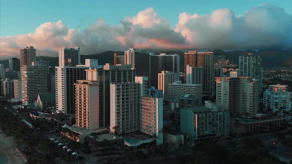 Aerial drone footage of Honolulu, Hawaii. Beautiful real estate, buildings in the city. Palm trees