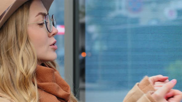 Surprised Young Beautiful Woman Outdoors Emotional Girl in Hat and Glasses Happy Jumping Amazed