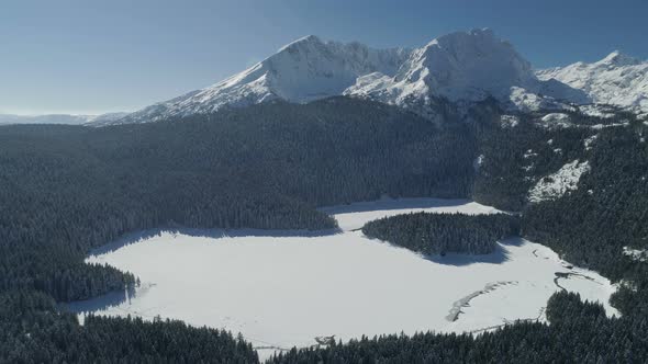 Aerial Winter View of Snow Covered Black Lake in Durmitor Mountains National Park