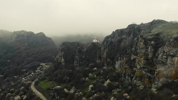 Aerial View of Ancient Temple on Top of Mountain