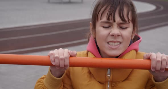 Make exercises on bars outdoor. 