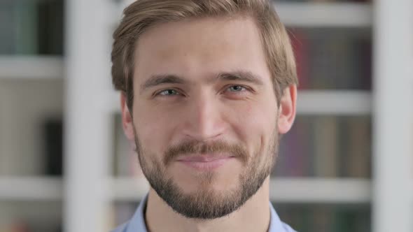 Close Up of Face of Man Smiling at the Camera