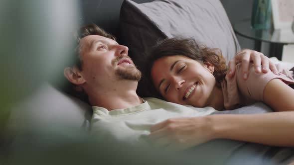 Affectionate Wife and Husband Bonding in Bed