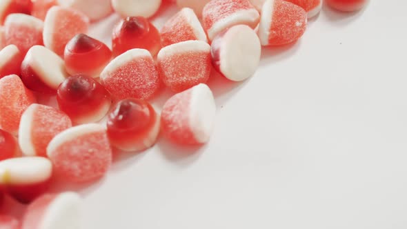 Close up view of halloween candy corn fallen against grey background