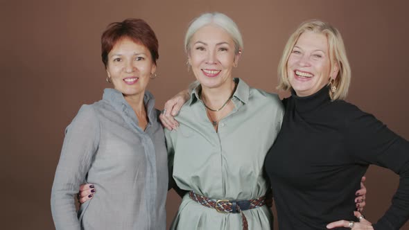 Portrait of Three Mature Women on Studio Background