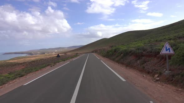 View From Car Driving on Road Along Atlantic Coast