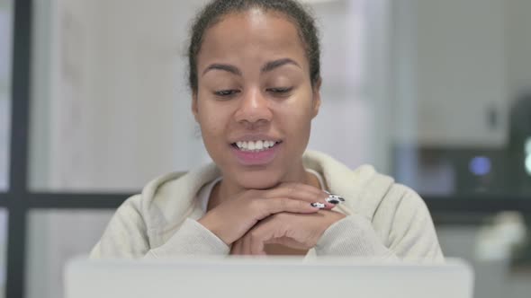 Close Up of African Woman Talking on Video Call on Laptop