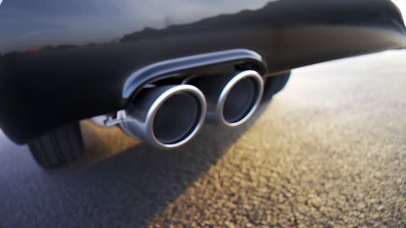 Chrome car exhaust closeup, sunny day on asphalt, pollution, power, durability.