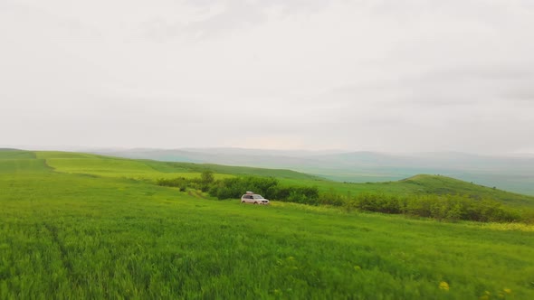 Mitsubishi Off Road In Green Field