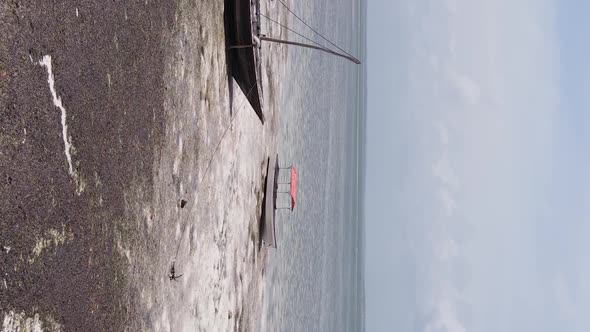 Vertical Video of Low Tide in the Ocean Near the Coast of Zanzibar Tanzania Aerial View