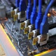 Closeup Cryptocurrency Mining Rig PCIe Riser Extenders Plugged to Motherboard - VideoHive Item for Sale