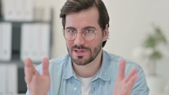 Portrait of Video Call By Young Man