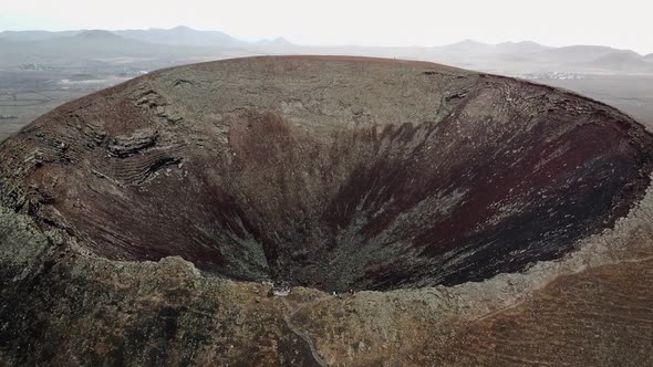 Aerial Bird View Footage of Calderon Hondo Volcanic Crater is an Approximately Circular Hole in the