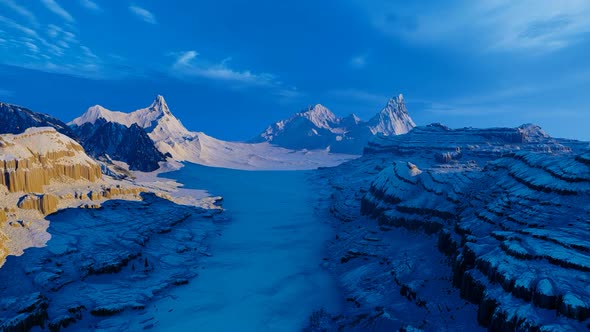 Flight over a mountain hollow covered with snow