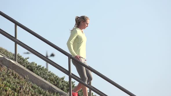 A woman running stairs