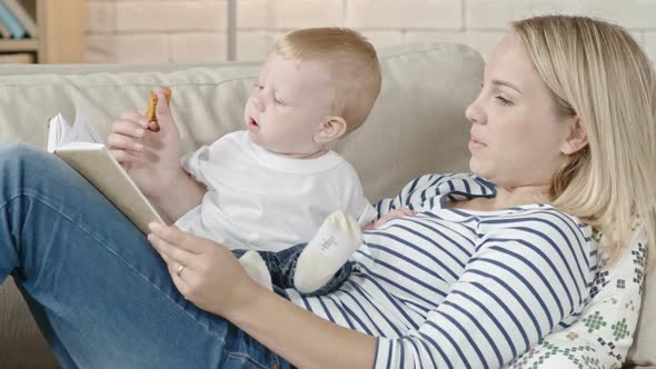 Mother and Toddler Son Reading Stories