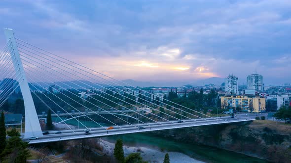 Podgorica Montenegro - Millennium cable stayed bridge over Moraca river at night - time lapse.