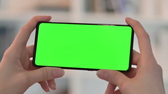 Watching Content on Smartphone with Chroma Key Screen 