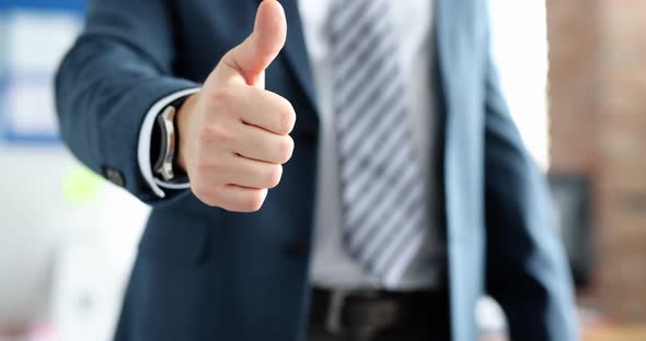 Businessman in Suit Showing Thumb Up Closeup  Movie Slow Motion