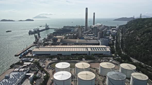 An aerial view of petrochemical industry in sunny morning , Hong Kong coal power station and oil tan