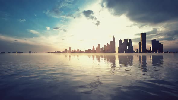 Skyline with Skyscrapers and Sea at Sunset