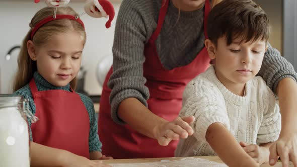 Video of mother and children prepared for Christmas baking. Shot with RED helium camera in 8K