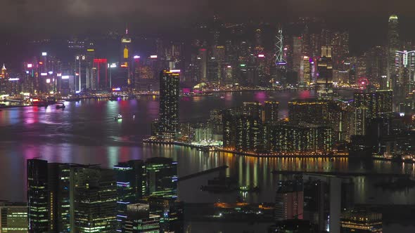 Timelapse Buildings Illumination Reflected in Hong Kong Bay