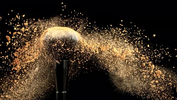 Super Slow Motion Closeup Shot of Makeup Powder Falling From Facial Brush at 1000Fps