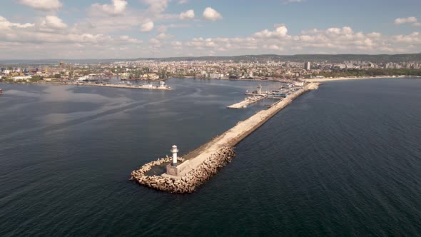 4K Aerial drone view of lighthouse and city of Varna, Bulgaria. Varna is the sea capital of Bulgaria