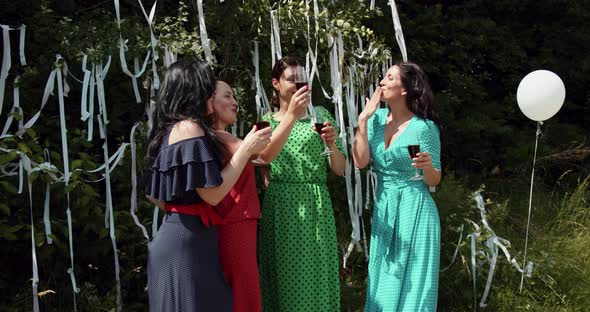 Girls Enjoy Nature With A Glass Of Wine