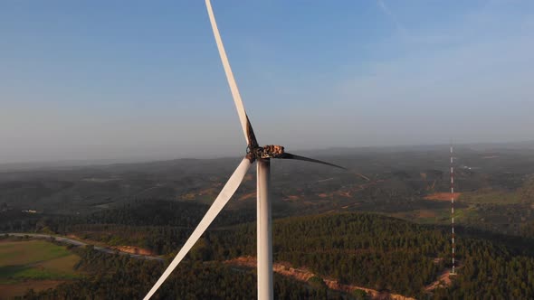 Wind energy turbine damaged by fire caused by short circuit or lightning strike, aerial