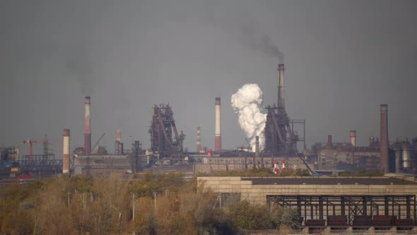 Industry Pipes Pollute the Atmosphere With Smoke