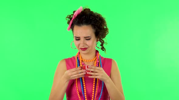 Girl Drinks Unpalatable Coffee and Is Disgusted on Green Screen