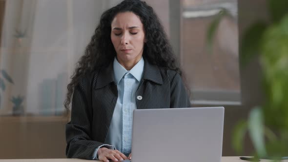 Stressful Young Business Woman Worker Feel Fatigue Headache Take Pause Sit in Lotus Position Doing