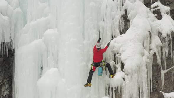 Climber scales huge ice cascade Maineline, Kineo Mountain 4K