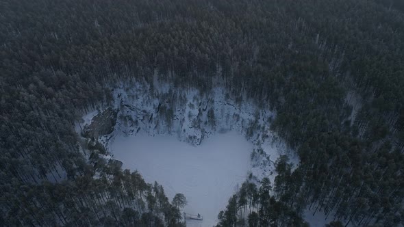 Flooded heart-like talc quarry "Talc stone" in forest near the Sysert city 07