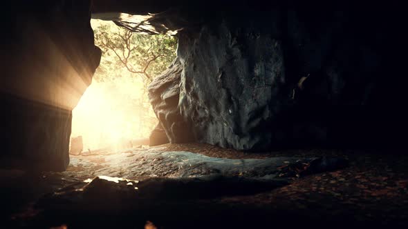 Breathtaking Scenery of Bright Sun Rays Falling Inside a Cave Illuminating