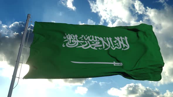 Saudi Arabia Flag Waving in the Wind Against Deep Blue Sky
