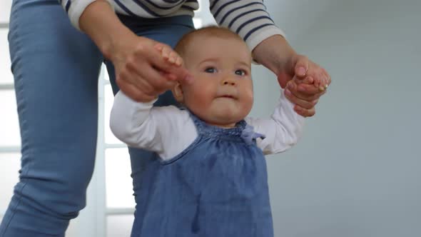 Baby Girl Taking Wobbly First Steps